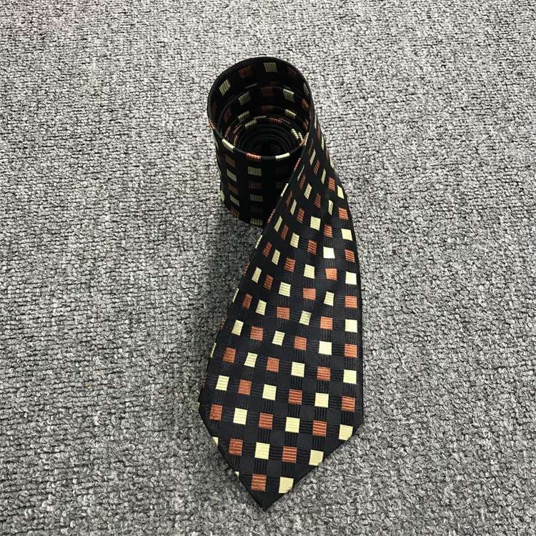  粋な幾何学柄シルクネクタイ
